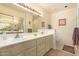 Bathroom with double vanity and large mirror at 7928 E Pueblo Ave # 62, Mesa, AZ 85208