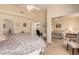 Main bedroom with mirrored closet doors and ensuite bathroom at 7928 E Pueblo Ave # 62, Mesa, AZ 85208