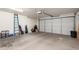 Garage with overhead door and ample space for storage at 7928 E Pueblo Ave # 62, Mesa, AZ 85208