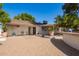 Large backyard with patio, grill, and trees at 8501 W Glenrosa Ave, Phoenix, AZ 85037