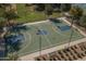 Aerial view of an outdoor basketball court with painted lines and shaded seating at 8517 W Mantle Way, Florence, AZ 85132