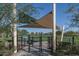 Gated dog park with shade and grassy areas for large breeds at 8517 W Mantle Way, Florence, AZ 85132