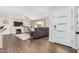 Bright living room with hardwood floors, fireplace, and modern decor at 8620 E Starlight Way, Scottsdale, AZ 85250