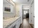 Guest bathroom with single vanity and granite countertop at 9275 E Mission Ln # 207, Scottsdale, AZ 85258