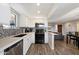 Modern kitchen featuring stainless steel appliances and stylish tile backsplash at 9275 E Mission Ln # 207, Scottsdale, AZ 85258