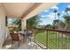 Private patio with table and chairs, overlooking green space at 9275 E Mission Ln # 207, Scottsdale, AZ 85258