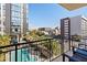 Balcony view overlooking the community pool and cityscape at 100 W Portland St # 401, Phoenix, AZ 85003