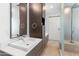 Modern bathroom with double vanity and large mirror at 100 W Portland St # 401, Phoenix, AZ 85003