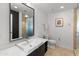 Clean bathroom with toilet, sink, and shower at 100 W Portland St # 401, Phoenix, AZ 85003