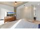 Main bedroom with large bed and ensuite bathroom at 100 W Portland St # 401, Phoenix, AZ 85003