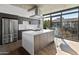 Modern kitchen with stainless steel appliances and island at 100 W Portland St # 401, Phoenix, AZ 85003