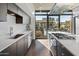 Modern kitchen with stainless steel appliances and ample cabinet space at 100 W Portland St # 401, Phoenix, AZ 85003