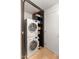 Stackable washer and dryer in a well-organized laundry closet at 100 W Portland St # 401, Phoenix, AZ 85003