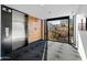 Modern building lobby with wood wall accents and elevator access at 100 W Portland St # 401, Phoenix, AZ 85003