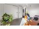 Home office with desk, chair, and large plant at 100 W Portland St # 401, Phoenix, AZ 85003
