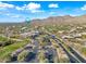 Ancala Country Club aerial view, showing clubhouse, parking lot, and golf course at 12129 N 114Th Way, Scottsdale, AZ 85259