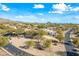 Aerial view of a luxurious home with a pool and landscaped grounds at 12129 N 114Th Way, Scottsdale, AZ 85259