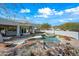 Stunning backyard with a pool, waterfall, and spacious patio at 12129 N 114Th Way, Scottsdale, AZ 85259