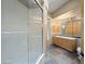 Bathroom with double sinks, shower and tile flooring at 12129 N 114Th Way, Scottsdale, AZ 85259