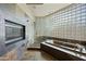 Bathroom with shower, soaking tub and fireplace at 12129 N 114Th Way, Scottsdale, AZ 85259