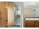 Bathroom with double sinks and a view of bedroom at 12129 N 114Th Way, Scottsdale, AZ 85259