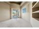 Bright bedroom with sliding glass doors leading to a patio at 12129 N 114Th Way, Scottsdale, AZ 85259