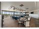 Elegant dining room with large windows and comfortable seating at 12129 N 114Th Way, Scottsdale, AZ 85259