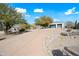 Two-car garage and driveway of a luxury home at 12129 N 114Th Way, Scottsdale, AZ 85259