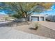 Luxury home with two-car garage and desert landscaping at 12129 N 114Th Way, Scottsdale, AZ 85259