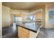 Spacious kitchen with island, stainless steel appliances, and granite countertops at 12129 N 114Th Way, Scottsdale, AZ 85259