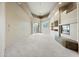 Spacious living room featuring a fireplace and built-in shelving at 12129 N 114Th Way, Scottsdale, AZ 85259