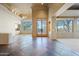 Spacious living room with tile floors and large windows at 12129 N 114Th Way, Scottsdale, AZ 85259