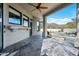 Covered patio with tile flooring, access to pool, and mountain views at 12129 N 114Th Way, Scottsdale, AZ 85259