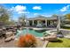 Inviting pool area with a waterfall and patio at 12129 N 114Th Way, Scottsdale, AZ 85259