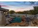 Relaxing pool and spa with waterfall at sunset at 12129 N 114Th Way, Scottsdale, AZ 85259
