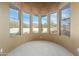 Sunroom with bay windows offering scenic views at 12129 N 114Th Way, Scottsdale, AZ 85259
