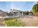 Large backyard with pool, patio, and ample green space at 12858 W Wilshire Dr, Avondale, AZ 85392