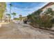 Landscaped backyard with a view of the pool and patio at 12858 W Wilshire Dr, Avondale, AZ 85392