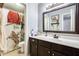 Bathroom with shower/tub combo and vanity with storage at 12858 W Wilshire Dr, Avondale, AZ 85392