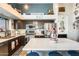 Spacious kitchen with an island and dark wood cabinets at 12858 W Wilshire Dr, Avondale, AZ 85392