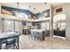 Eat-in kitchen with island and access to backyard patio at 12858 W Wilshire Dr, Avondale, AZ 85392