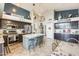 Bright kitchen with an island and plenty of cabinet space at 12858 W Wilshire Dr, Avondale, AZ 85392