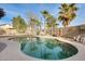 Relaxing kidney-shaped pool, perfect for outdoor enjoyment at 12858 W Wilshire Dr, Avondale, AZ 85392