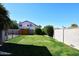 Spacious backyard with grassy area and block wall at 19520 N 65Th Ave, Glendale, AZ 85308