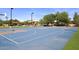 Well-maintained outdoor basketball court with markings at 19520 N 65Th Ave, Glendale, AZ 85308