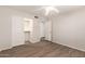 This bright bedroom includes access to the ensuite bathroom and walk-in closet at 19520 N 65Th Ave, Glendale, AZ 85308