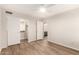 This bright bedroom includes access to the ensuite bathroom and walk-in closet at 19520 N 65Th Ave, Glendale, AZ 85308