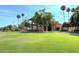 Community clubhouse with large green space at 19520 N 65Th Ave, Glendale, AZ 85308