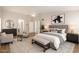 Spacious main bedroom with neutral tones, a ceiling fan, and ample natural light at 19520 N 65Th Ave, Glendale, AZ 85308