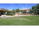 Community playground with shaded areas and play structures at 19520 N 65Th Ave, Glendale, AZ 85308